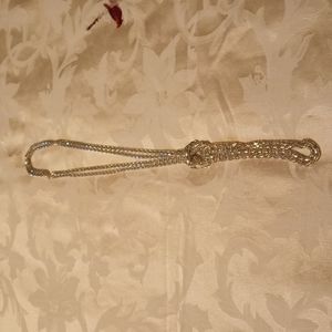 Women's silver tone 2 stranded  necklace, twisted to make a bow or Doubled.Used.